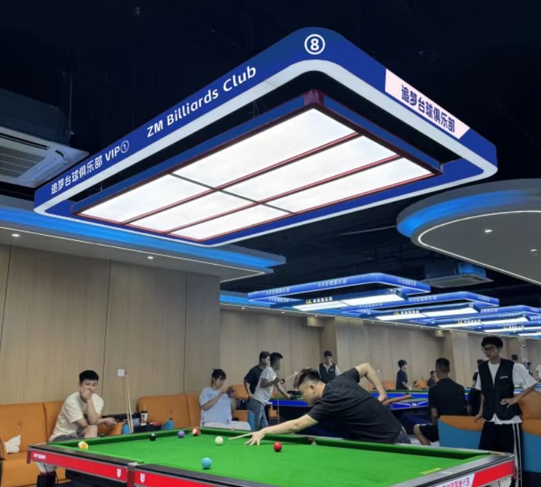 Blue custom shadowless LED light above a billiard table